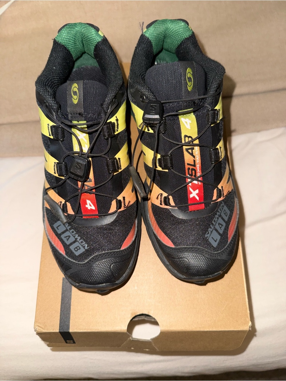 Salomon Black Trail Runners with Yellow, Orange & Green Accents